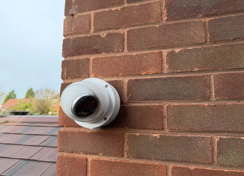 Dome CCTV camera mounted on a brick wall by MAC Secure