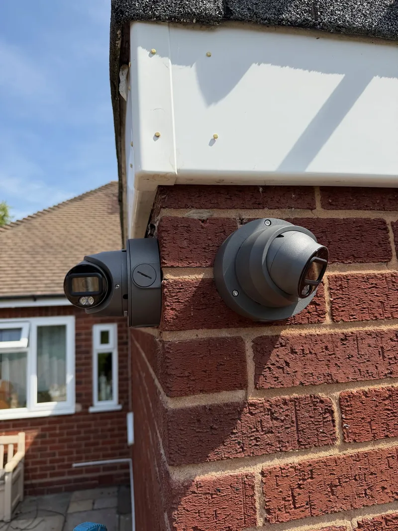 Two dome CCTV cameras covering a house corner, installed by MAC Secure